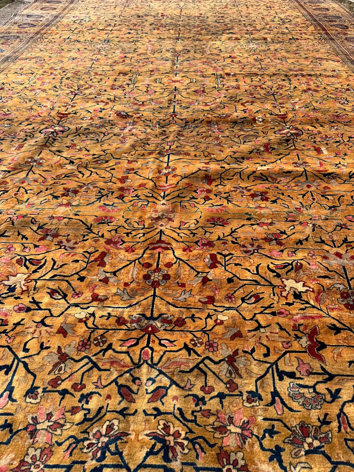 Antique Persian Kashan rug from the Ghazan workshop, with a yellow ground and fine branching floral design